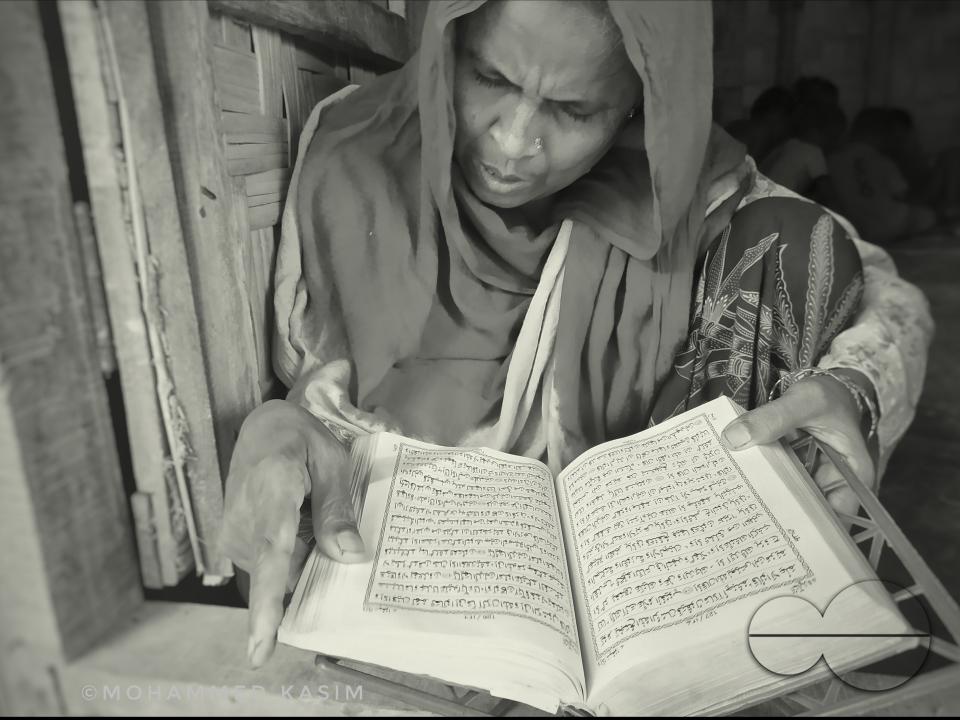 A woman reading the quran
