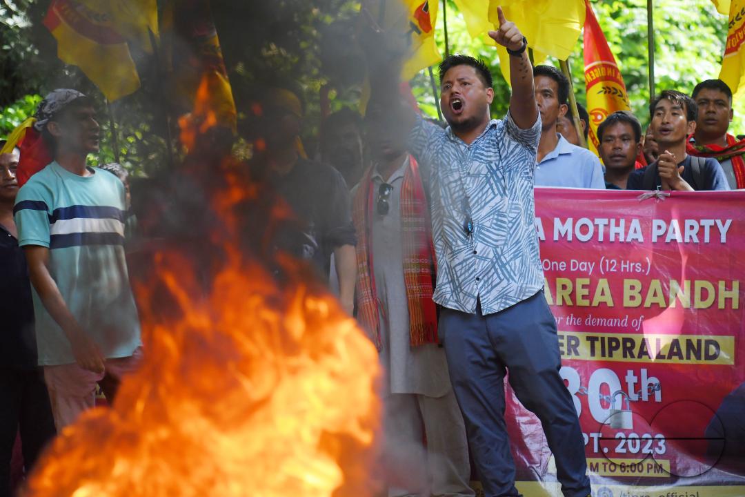 The âTipraha Indigenous Progressive Regional Alliance (TIPRA)ââ supporters raise slogans demanding a separate Greater Tipraland state for tribals, in Bermuda Ashram Para