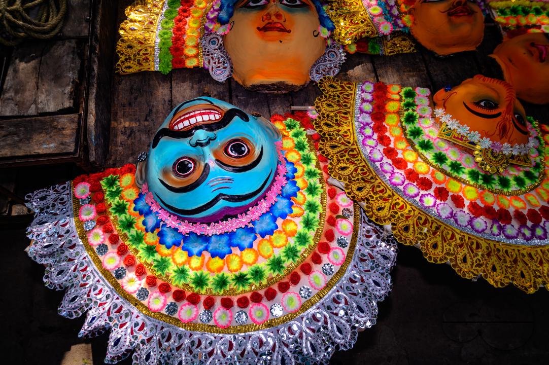 A village idol artist makes large color masks modeled after Purulia Chhau dance masks (Purulia Chhau dance is listed on UNESCO's World Heritage list of dances) of goddesses, animals, and rakshasas (humanoid demons or unrighteous spirits) like Hindu mytho