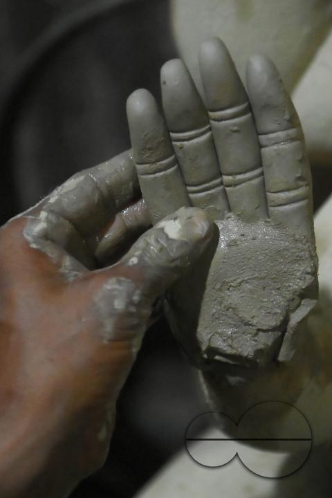 An Idol maker making idols of Lord Ganesh in a studio for the upcoming Ganesh Chaturthi festival at Agartala