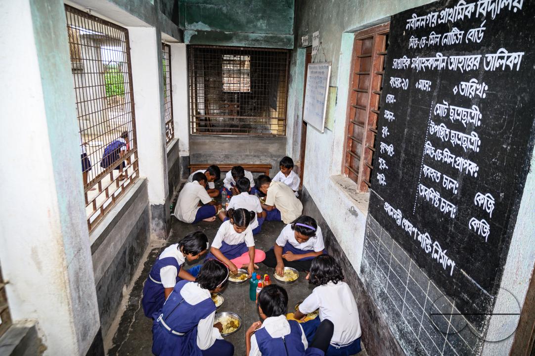 The mid-day meal scheme is a school meal program of the Government of India designed to better the nutritional standing of school-age children nationwide