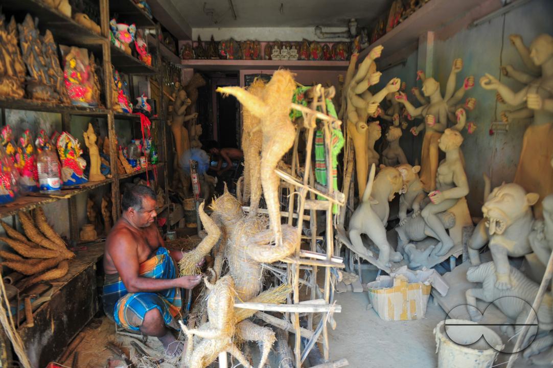 Nondi Pal, an idol artist is working on structures of Hindu Deity in preparation for the upcoming Durga Puja Festival 2023