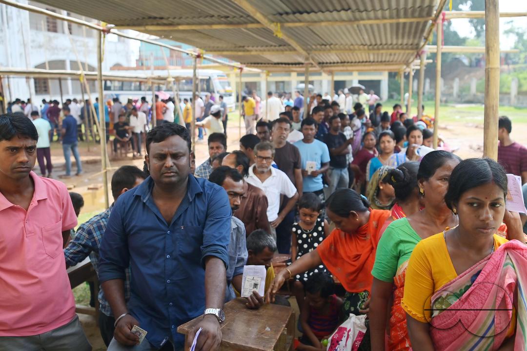 Voters queue up at a Sonamura polling station in Agartala for the Lok Sabha elections