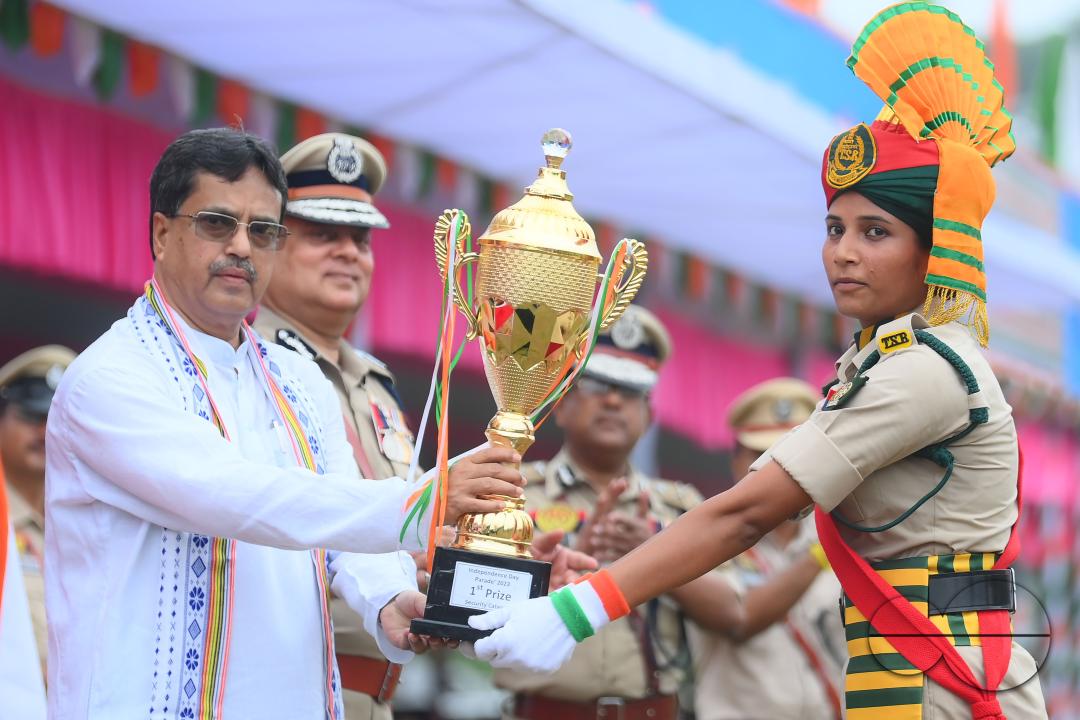 Tripura Chief Minister Manik Saha distributes awards and medals to the soldiers of different platoons during the 77th Independence Day function at the Assam Rifles ground in Agartala