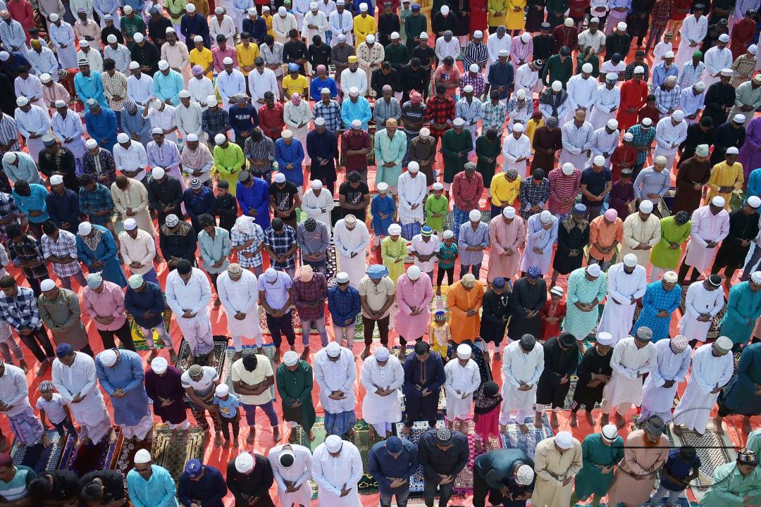 Devotees celebrate Eid-ul-Fitr with prayers ("Namaz") at a mosque in Agartala