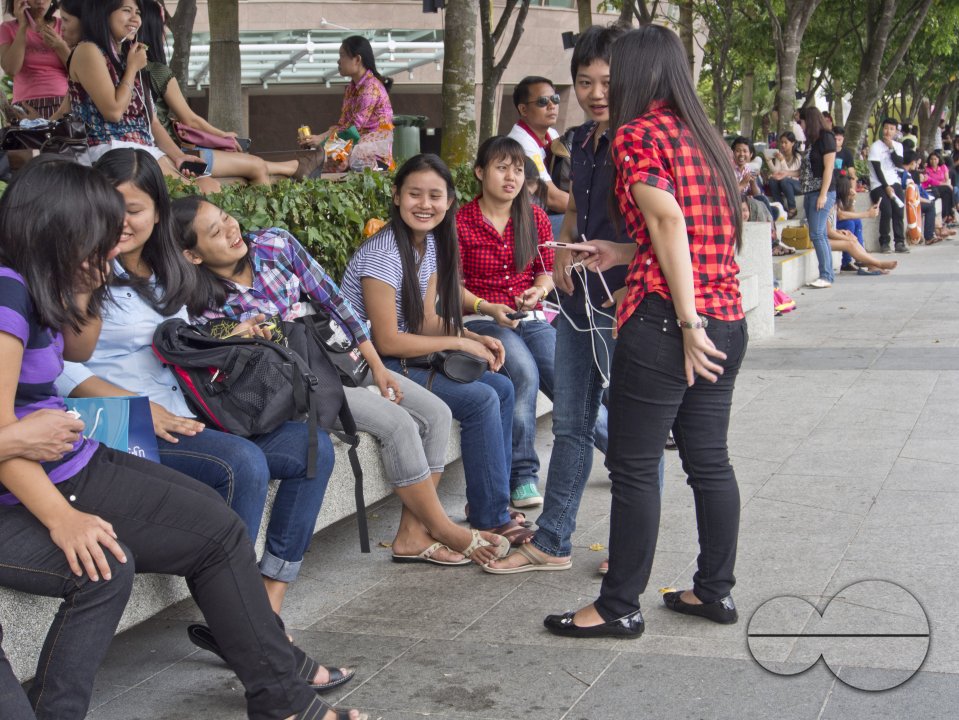Migrant domestic workers enjoy a day off by the Bay side in Singapore