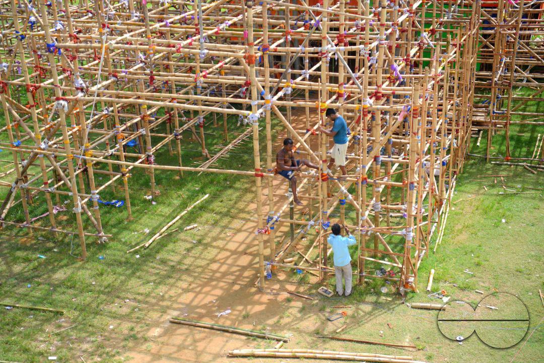 Workers are making a temporary bamboo structure, locally called "Pandal", for the upcoming Durga Puja in Agartala