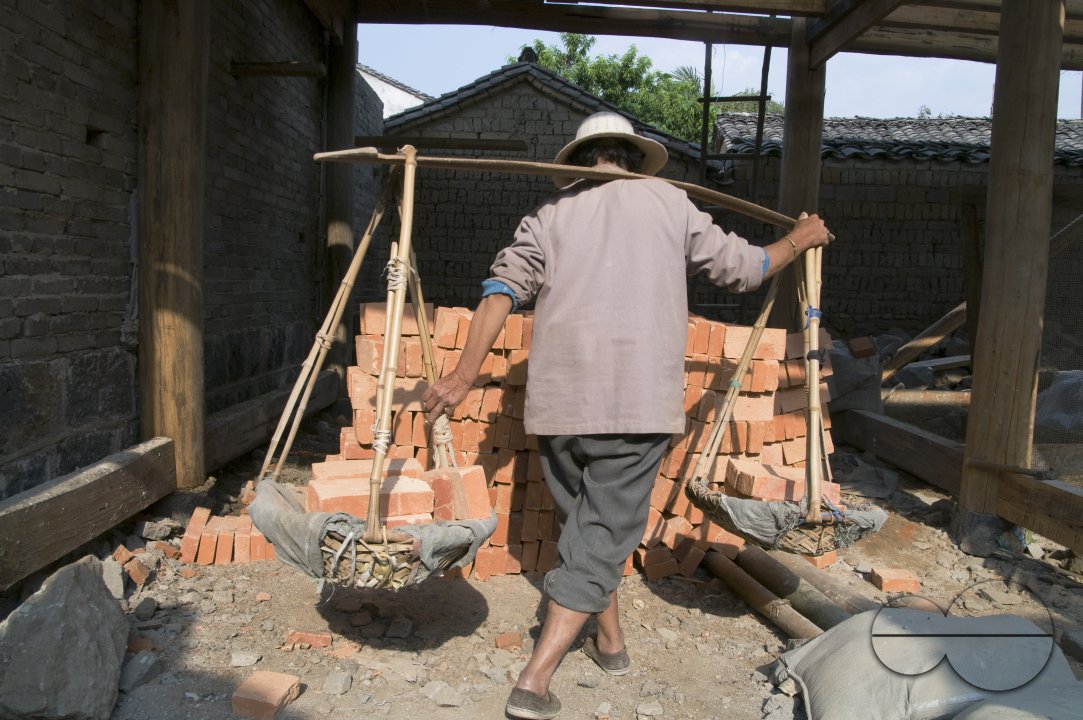 CHINA Migrant workers from the countryside working in construction in Kunming, Yunnan province.