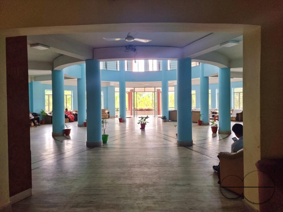 The blue interior of the State Guest House, Agartala, welcomes guests on entry