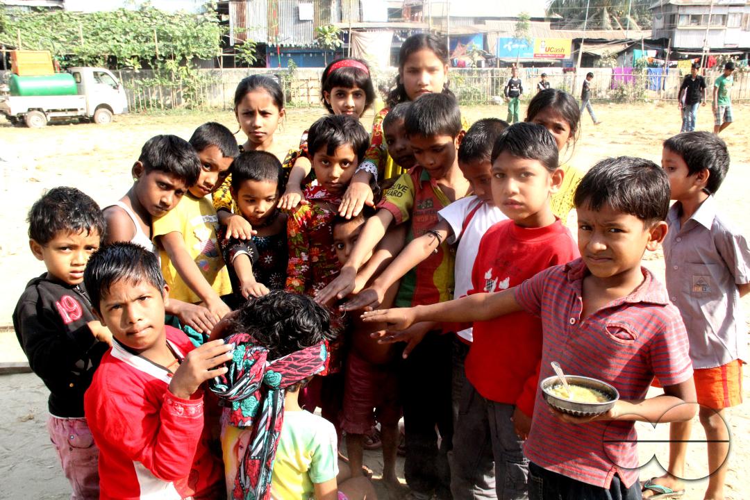 Portrait of children playing in the slums of Rayer bazar
