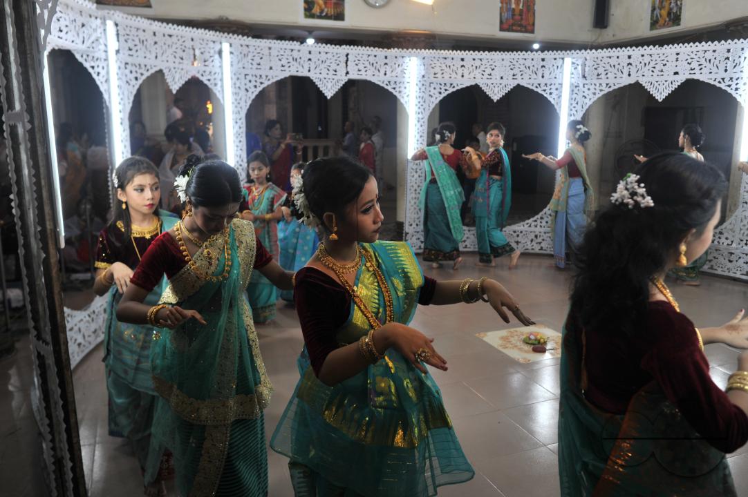 The manipuri community dancing with their traditional dresses