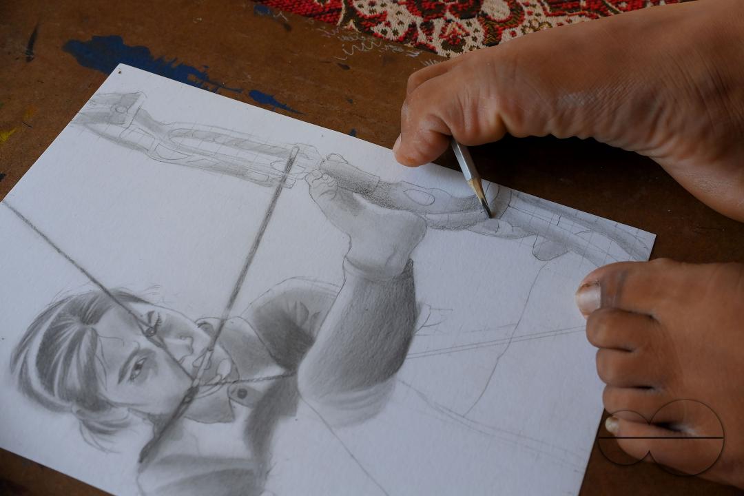 A 23-year-old differently abled artist Pralay Dey, is pursuing his bachelorâs degree in psychology from Tripura Central University