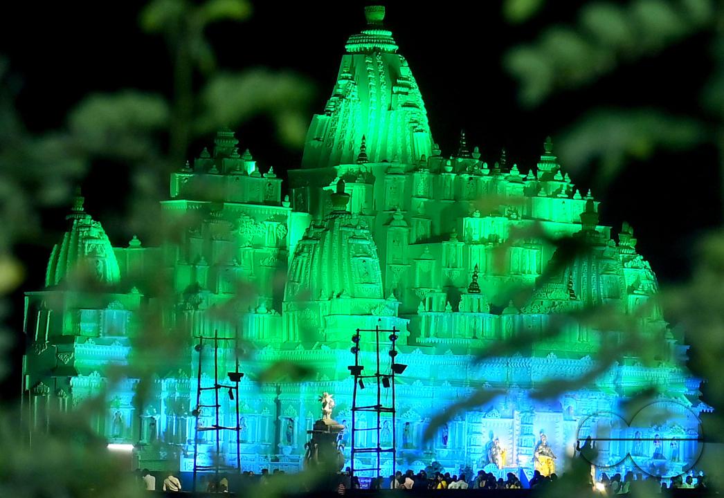 An illuminated "pandal", or temporary platform is seen where the idols of Durga are kept, and the worship of the Mother Goddess Durga is taking place during the Durga Puja festival in Agartala