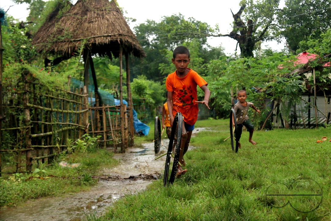 Rural Bangladeshi children happily playing in the neighborhood