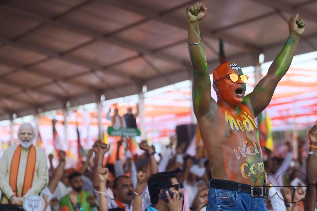 Supporters of the BJP at a rally of Prime Minister Narendra Modi ahead of the Lok Sabha Election in Agartala