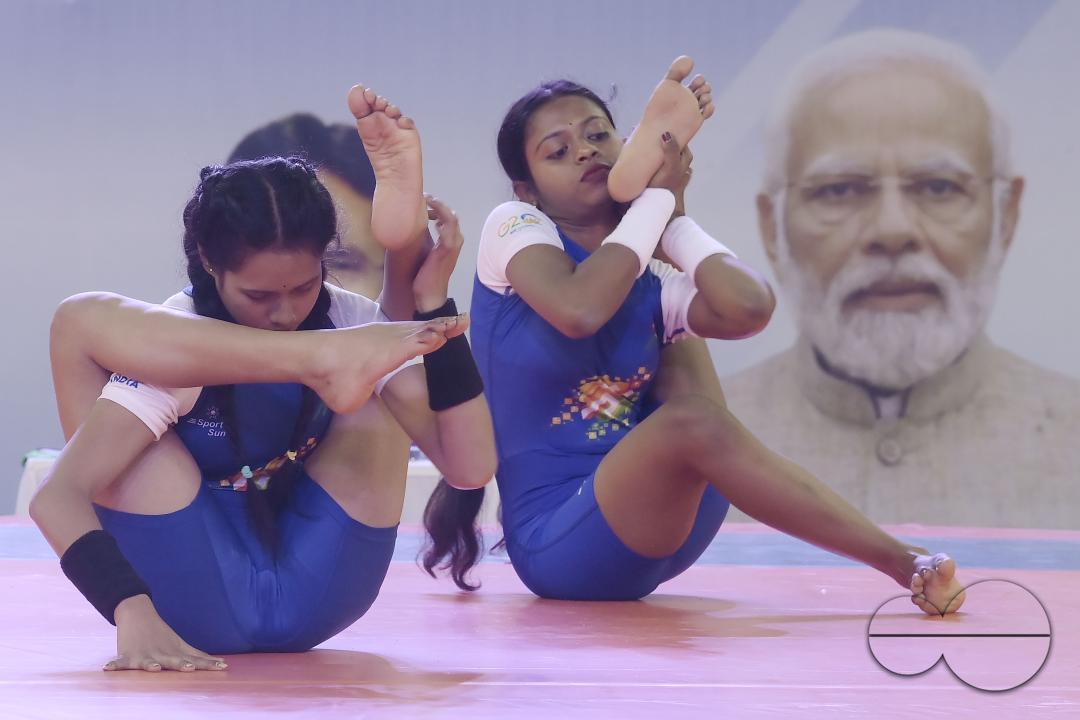 Students of Kalyani University in Orissa perform Yoga at the Khelo India University Games competition