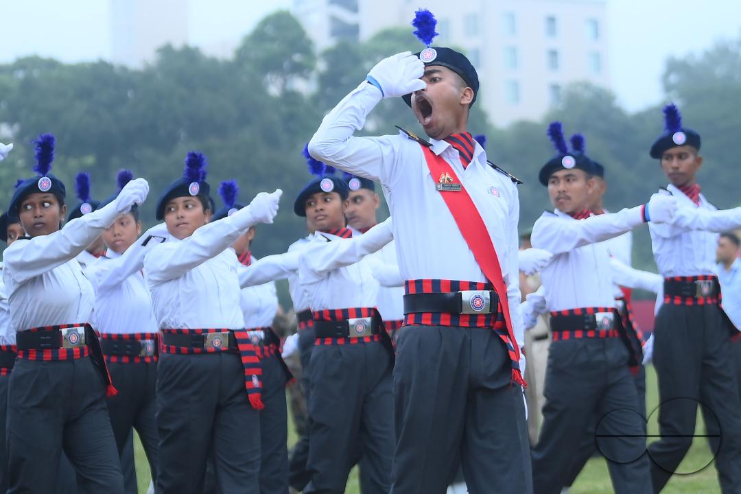 Soldiers of different platoons at the 77th Independence Day parade at the Assam Rifles ground in Agartala