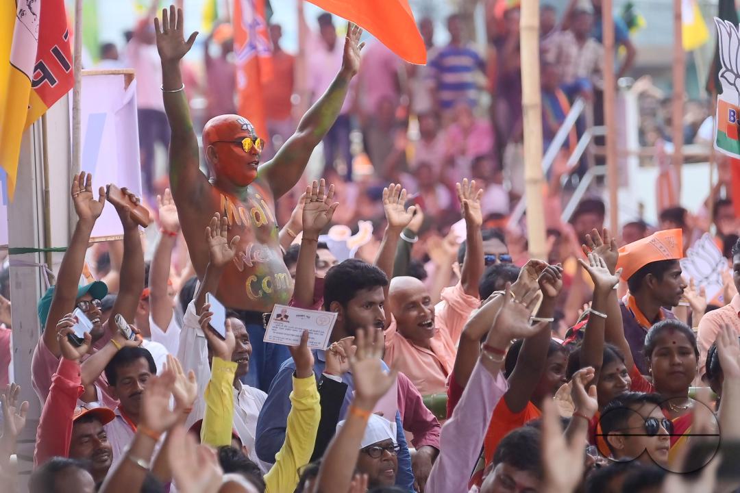 Supporters of the BJP at a rally of Prime Minister Narendra Modi ahead of the Lok Sabha Election in Agartala