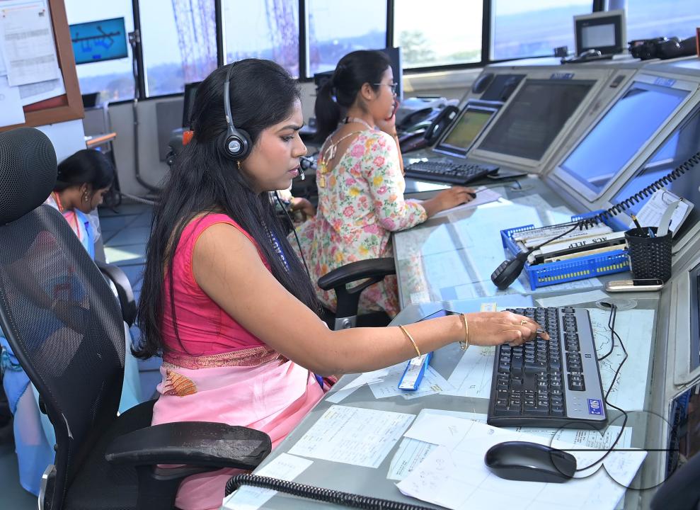 Female traffic controllers, Bipasha Hrangkhawl, Disha Chandra, and Chaya, take charge of traffic management at the Agartala airport's ATCT Tower to celebrate International Women's Day