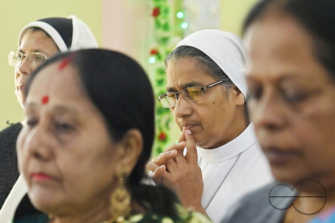 Christians attend a Christmas Mass in Mariam Nagar Church at Agartala