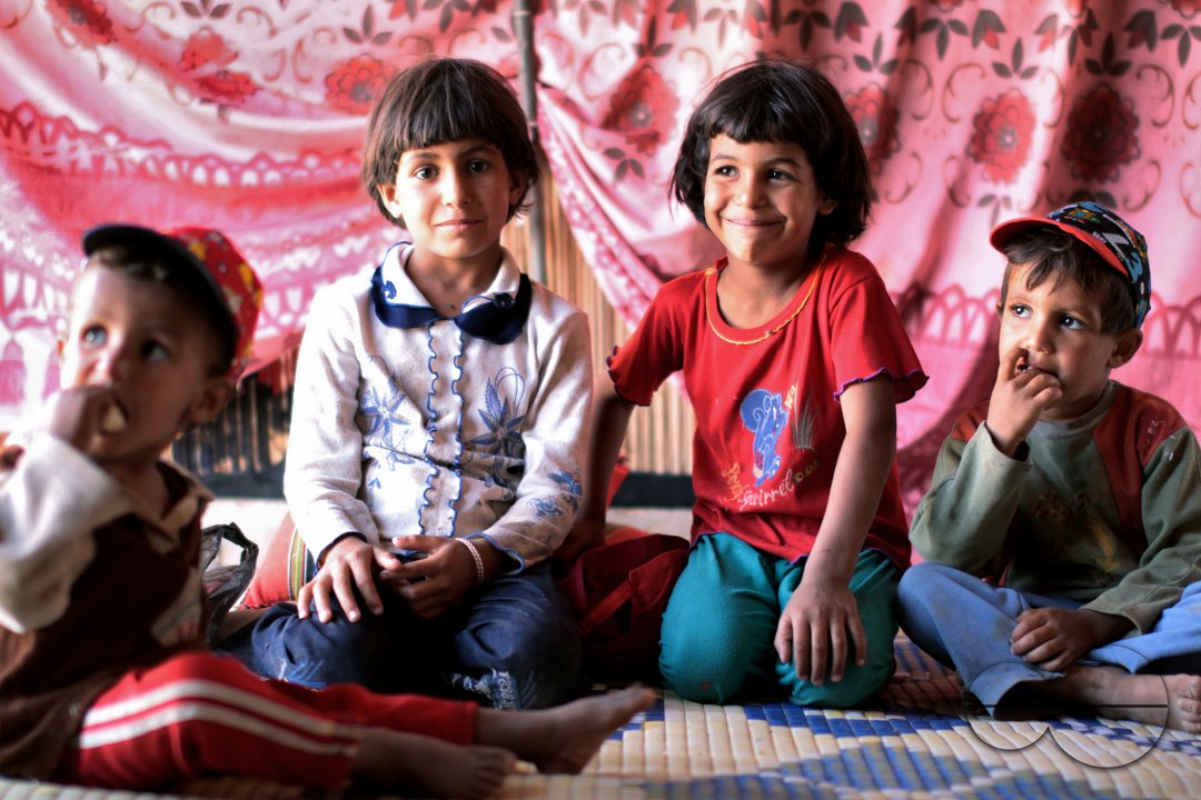 Photo story - Abu Mohammad and His family - the relationships between a poor family how they live.