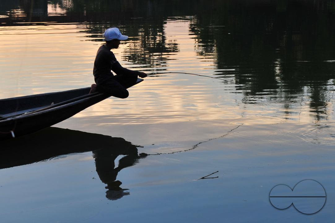 Children and people are catching fish