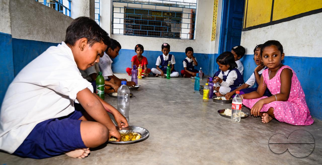 The mid-day meal scheme is a school meal program of the Government of India designed to better the nutritional standing of school-age children nationwide