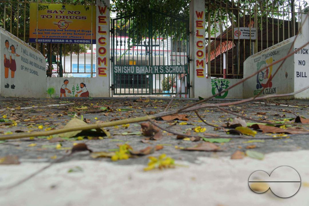 A locked gate of a government school during cyclone MidhiliÂ in Agartala
