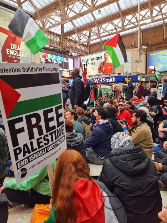 Thousands of protestors raise voices, carry placards and show their support for Palestinians, at Trafalgar Square, central London