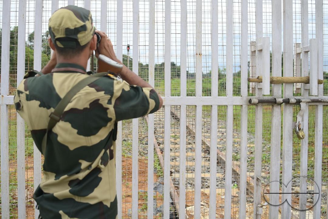 Security personals of the Border Security Force (BSF) providing tight security and patrolling the India- Bangladesh rail line in Nischinta Pur area, in precaution to the ongoing anti-quota protests in neighbouring country Bangladesh