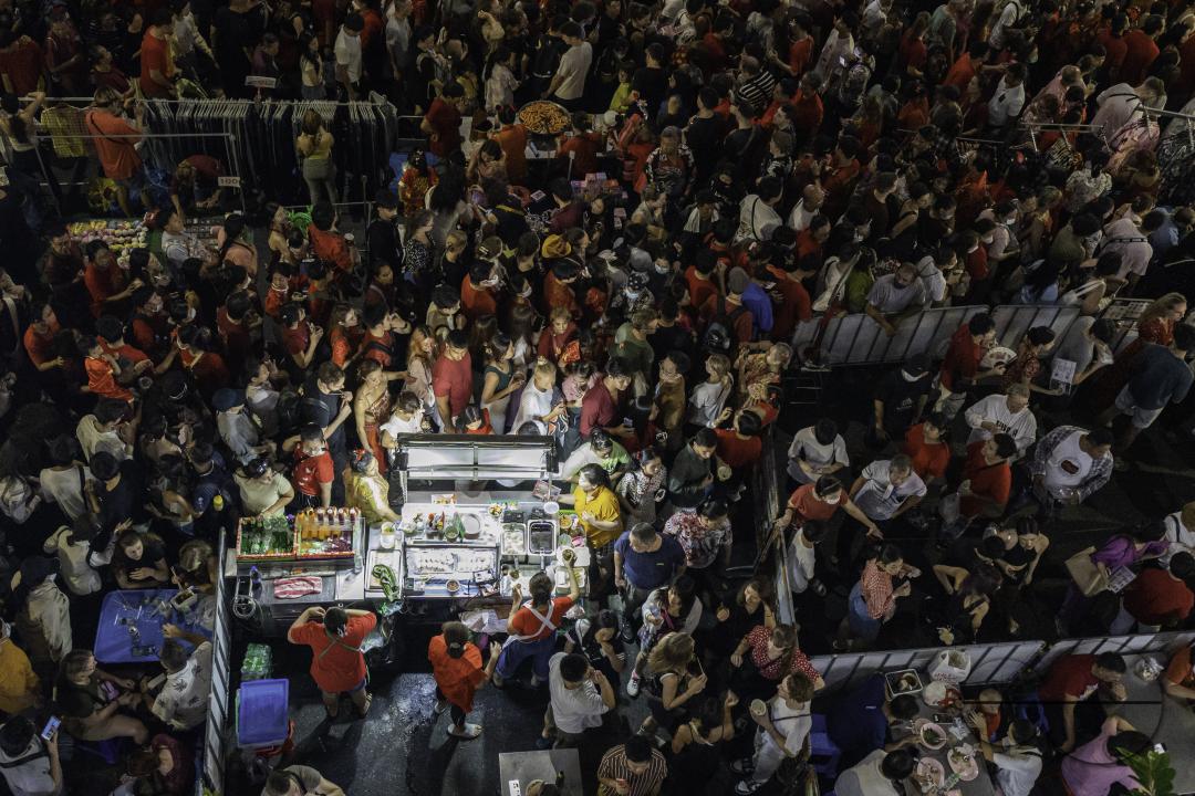A street food stall during the celebration of the Chinese New Year at Yaowarat Road in Chinatown, Bangkok, Thailand.