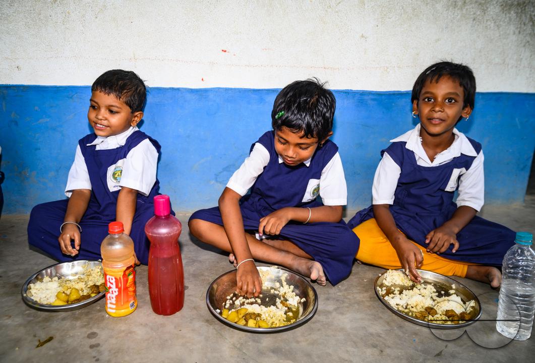 The mid-day meal scheme is a school meal program of the Government of India designed to better the nutritional standing of school-age children nationwide