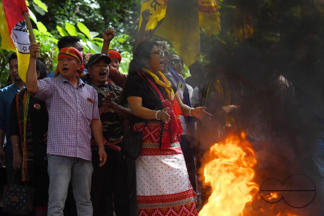 The âTipraha Indigenous Progressive Regional Alliance (TIPRA)ââ supporters raise slogans demanding a separate Greater Tipraland state for tribals, in Bermuda Ashram Para