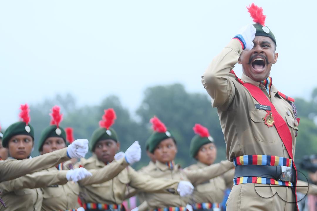 Soldiers of different platoons at the 77th Independence Day parade at the Assam Rifles ground in Agartala
