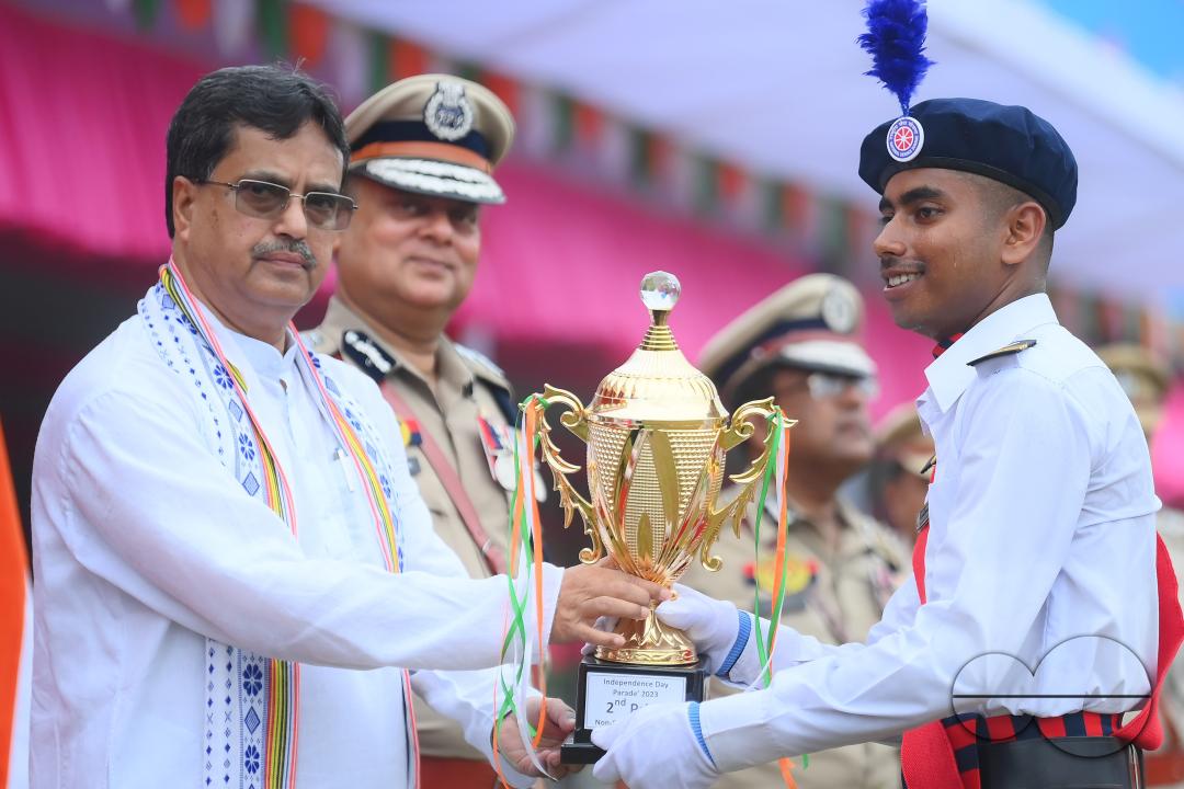 Tripura Chief Minister Manik Saha distributes awards and medals to the soldiers of different platoons during the 77th Independence Day function at the Assam Rifles ground in Agartala