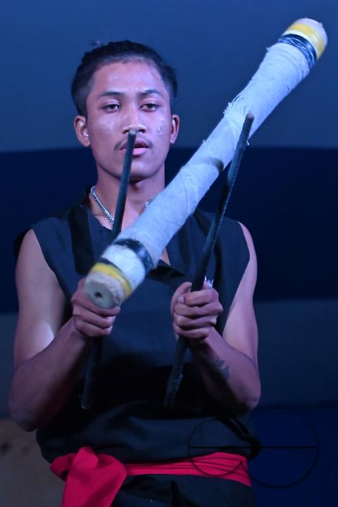 Manipuri martial arts students performing at the opening program of the 225th Raas Festival in Radha madhab Mandir at Agartala