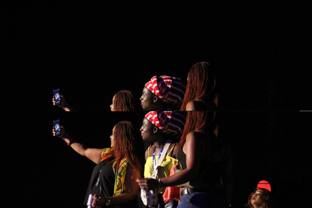 Young people taking a selfie during a concert at CIVO stadium in Lilongwe, Malawi.