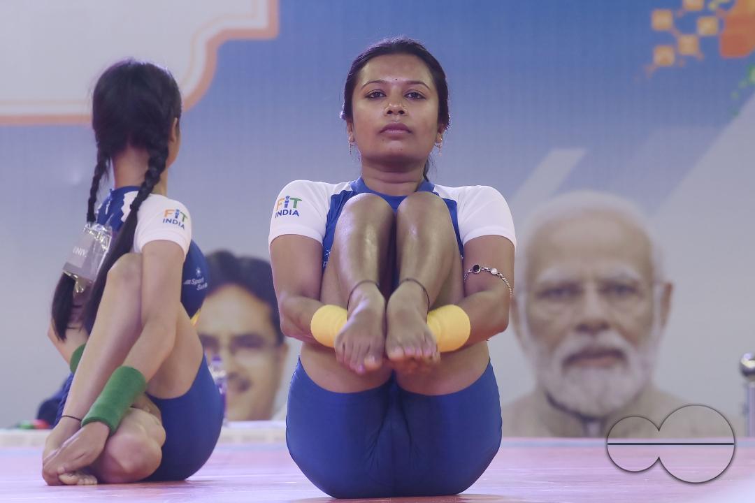 Students of Kalyani University in Orissa perform Yoga at the Khelo India University Games competition