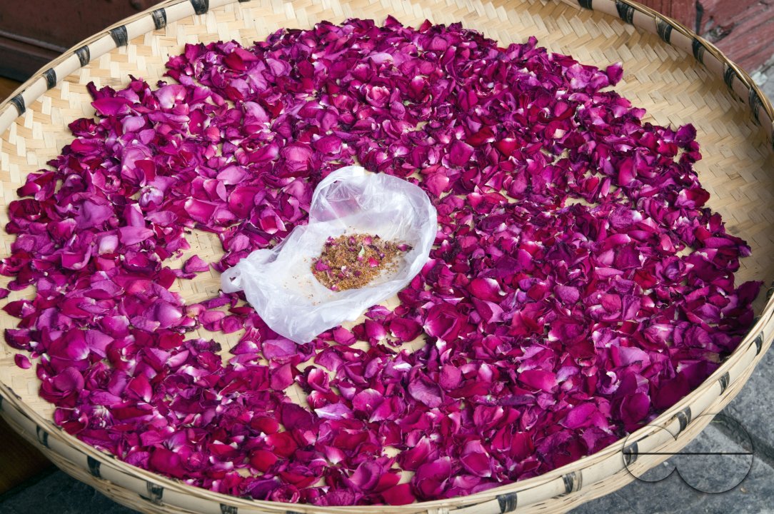 CHINA Flower petals drying in the sun in a village  in Fujian province.