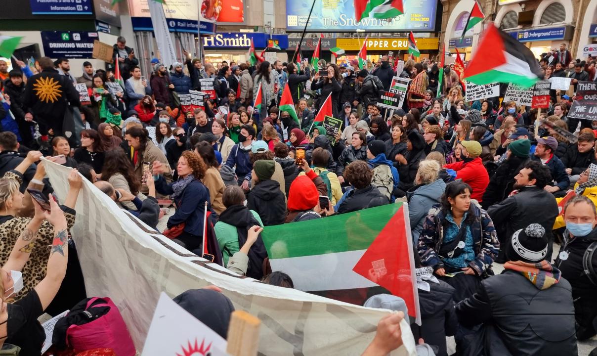 Thousands of protestors raise voices, carry placards and show their support for Palestinians, at Trafalgar Square, central London