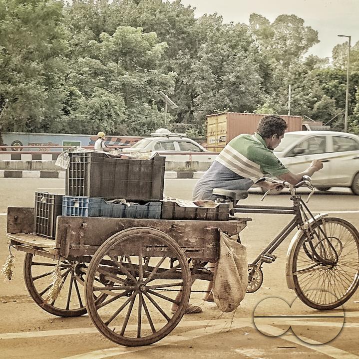 A man pushing a cart outside the Balukhali refugee camp