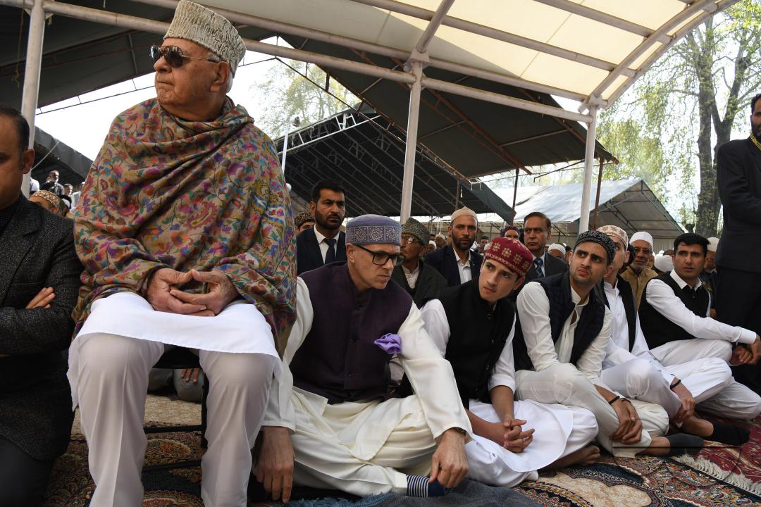 NC President Farooq Abdullah and his son Omar Abdullah offer eid prayers at Hazratbal Shrine in Srinagar
