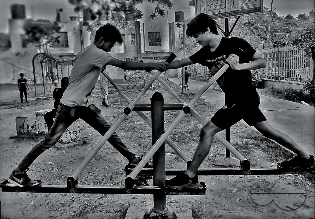 Two Rohingya adolescents are exercising at a local park in Nizamuddin, New Delhi, India.
