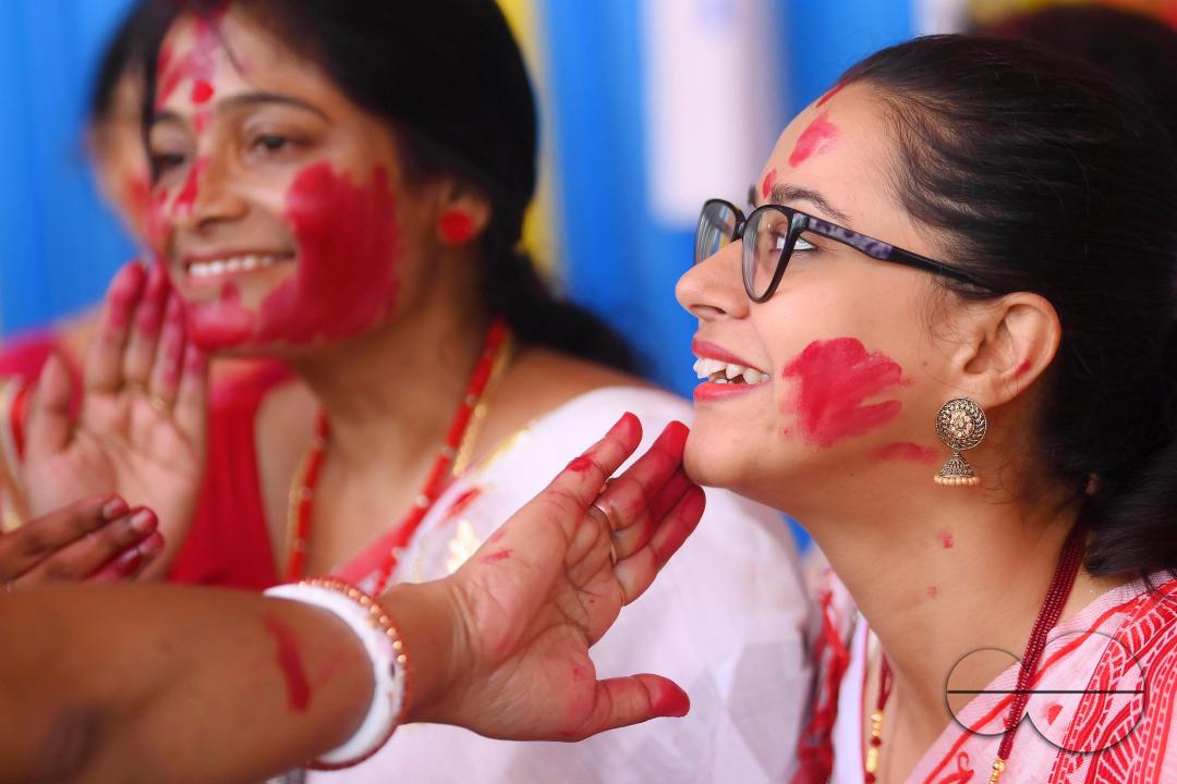Married ladies smear red Sindoor or Vermillion, a ritual known as Sindur Khela or Vermillion Game on Vijayadashami, the last day of the Durga Puja festival