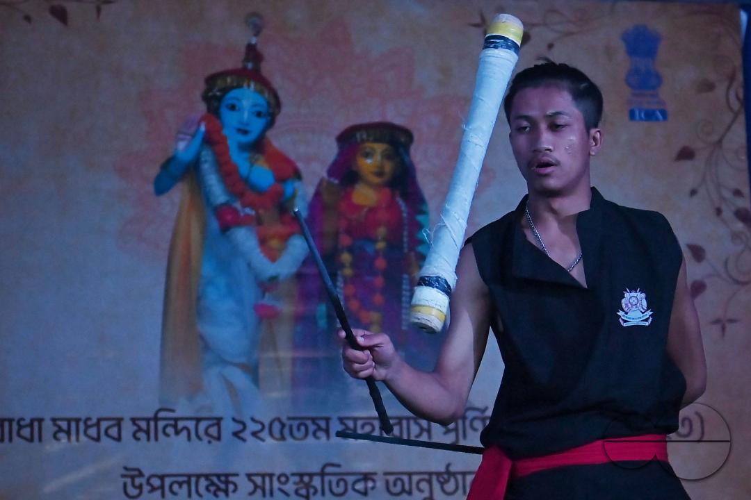 Manipuri martial arts students performing at the opening program of the 225th Raas Festival in Radha madhab Mandir at Agartala
