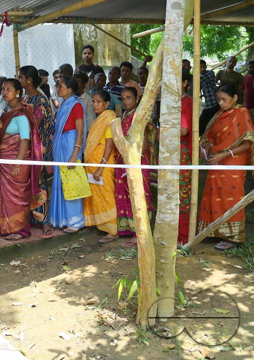 Voters queue up at a Sonamura polling station in Agartala for the Lok Sabha elections