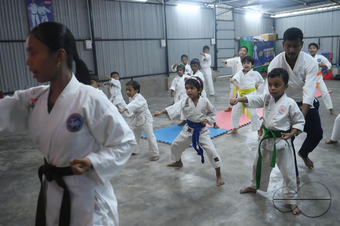 Children, who are students of the "Shotokan Karate-Do Association of Tripura", are seen performing karate during a special class on Children's day in Barjala, at Agartala