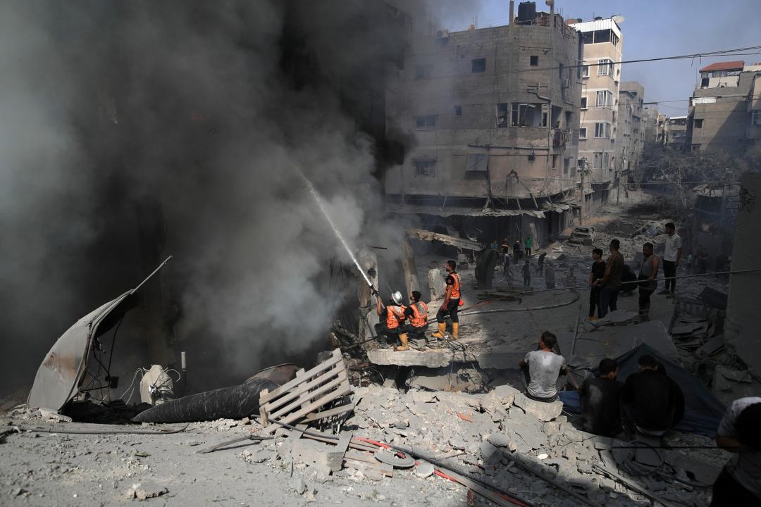 Israeli air strikes continue to bombard Gaza, burning to ground entire districts and filling morgues with dead Palestinians as Israel took revenge for the Hamas assaults that have triggered some of the worst blood-letting in 75 years of conflict