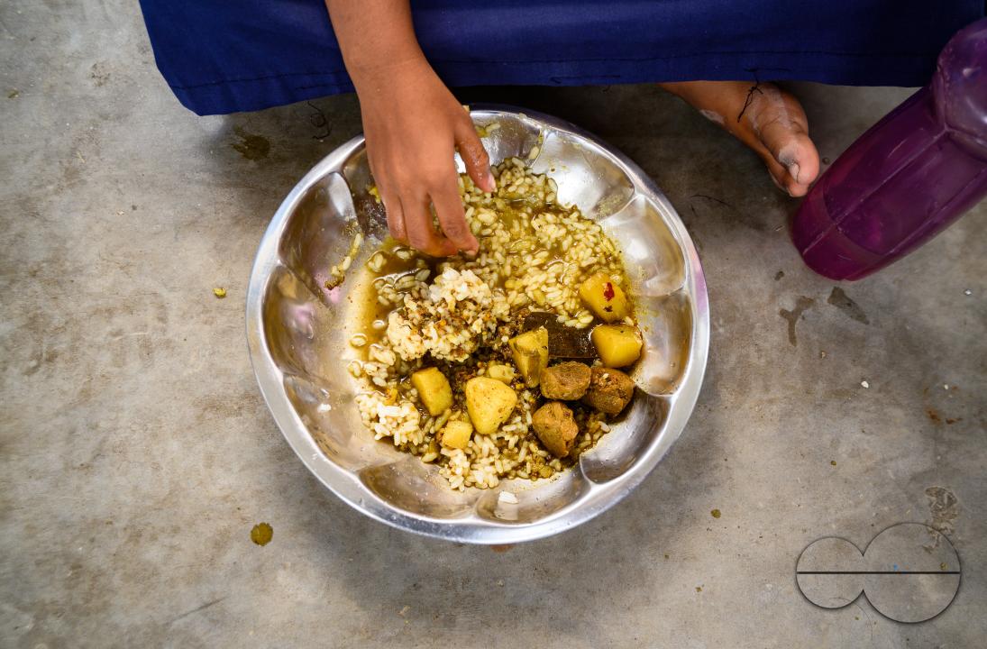 The mid-day meal scheme is a school meal program of the Government of India designed to better the nutritional standing of school-age children nationwide