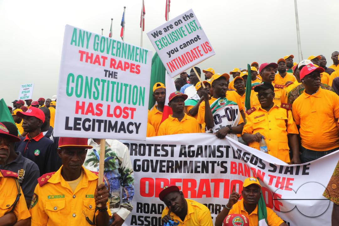 Members of  the Trade Union Congress (TUC) and the Road Transport Employers Association of Nigeria, RTEAN gather to protest against the ban on RTEAN operations by the Lagos state government in Ikeja, Lagos, Nigeria.
